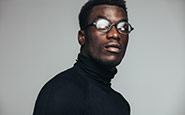 African man with clear glasses
